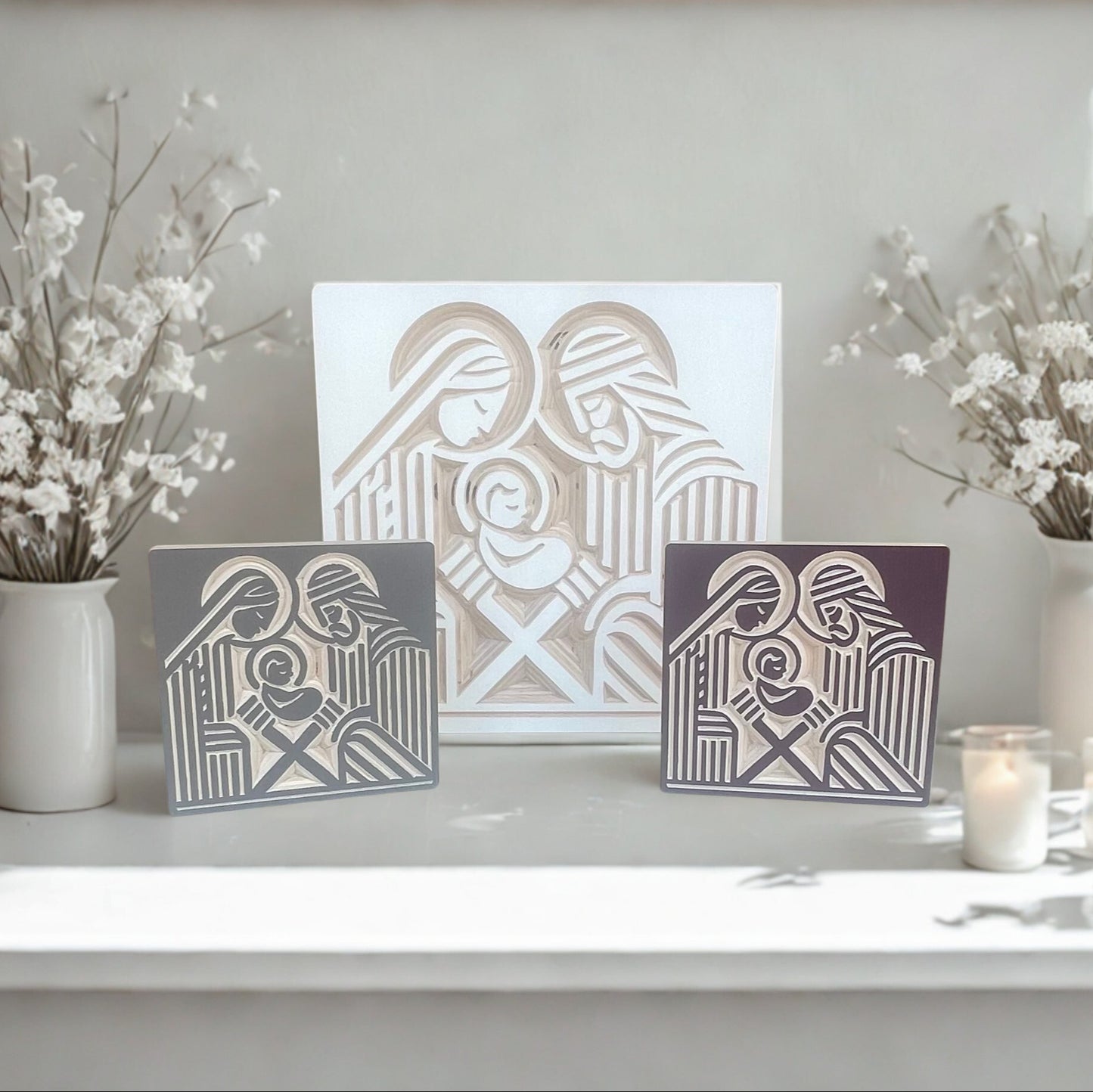 Decorative wood nativity pieces on a shelf with candles and flowers.