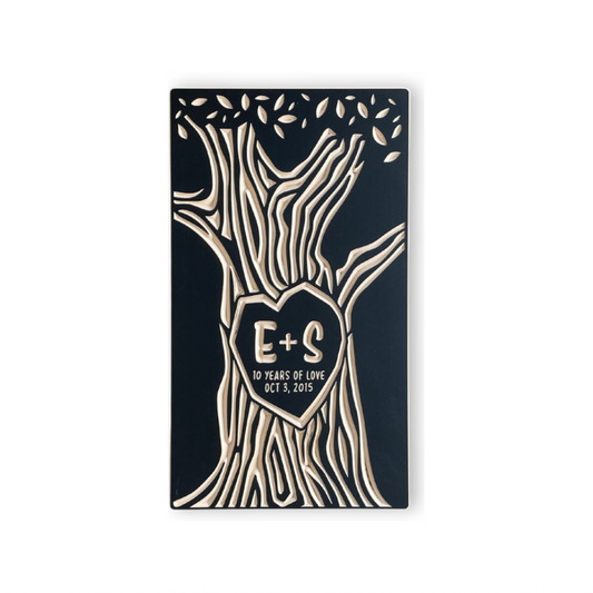 Decorative wall art with tree design and custom anniversary engraving on white background