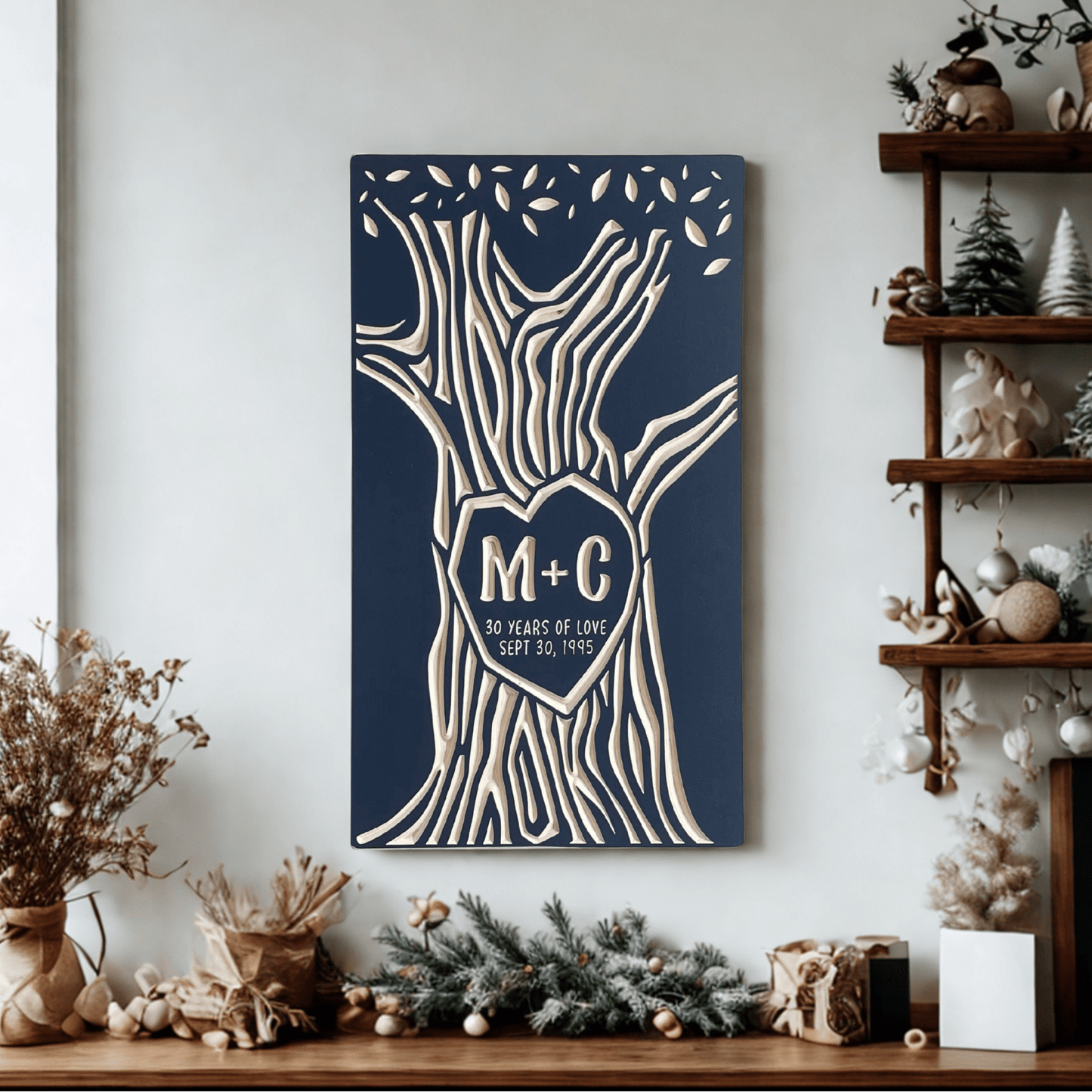 Decorative anniversary wall art with initials on a shelf with plants and decor