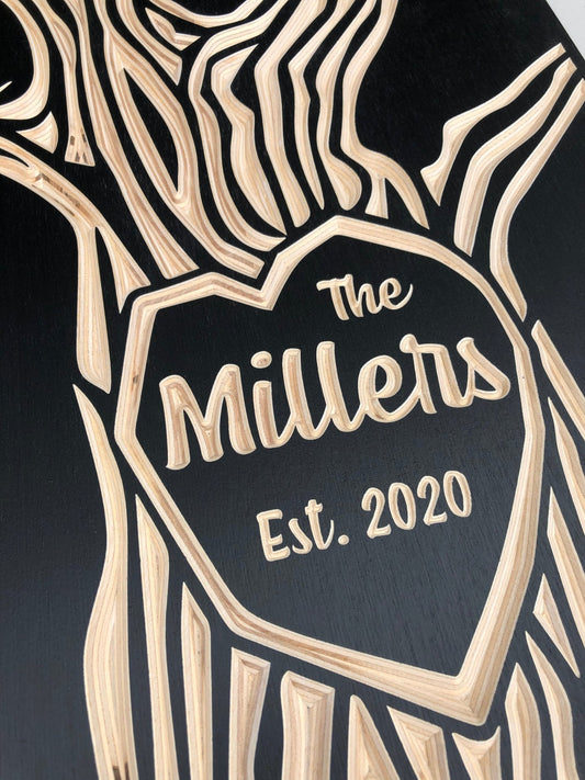 Close-up of wooden family tree wall art