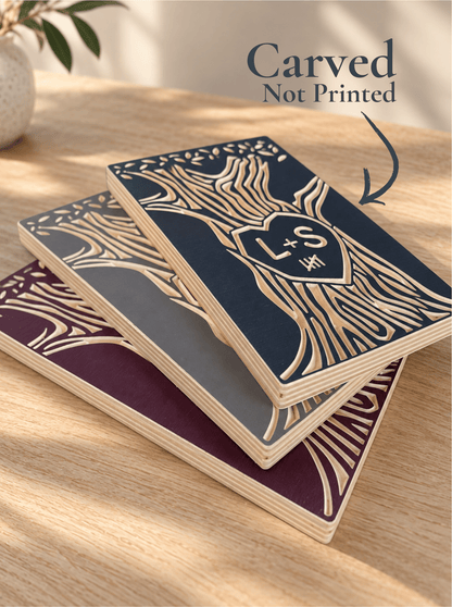 Three personalized Tally Tree anniversary wood signs in burgundy, navy and gray, featuring carved initials and anniversary tally marks.