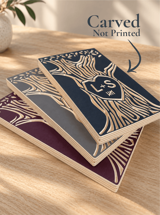 Three personalized Tally Tree anniversary wood signs in burgundy, navy and gray, featuring carved initials and anniversary tally marks.