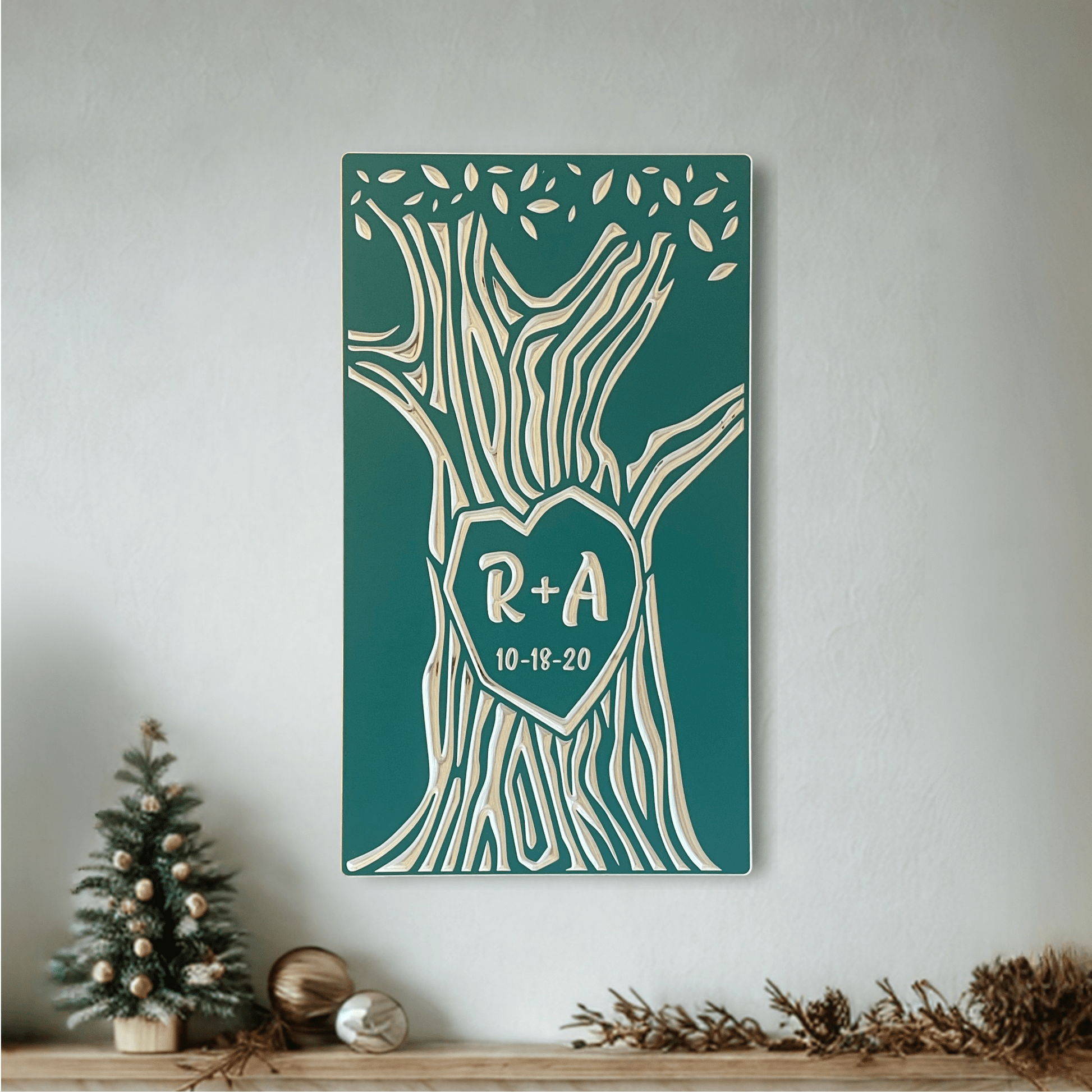 Teal Personalized Anniversary gift, custom carved tree with initials and date, hanging above a mantle with holiday decorations.