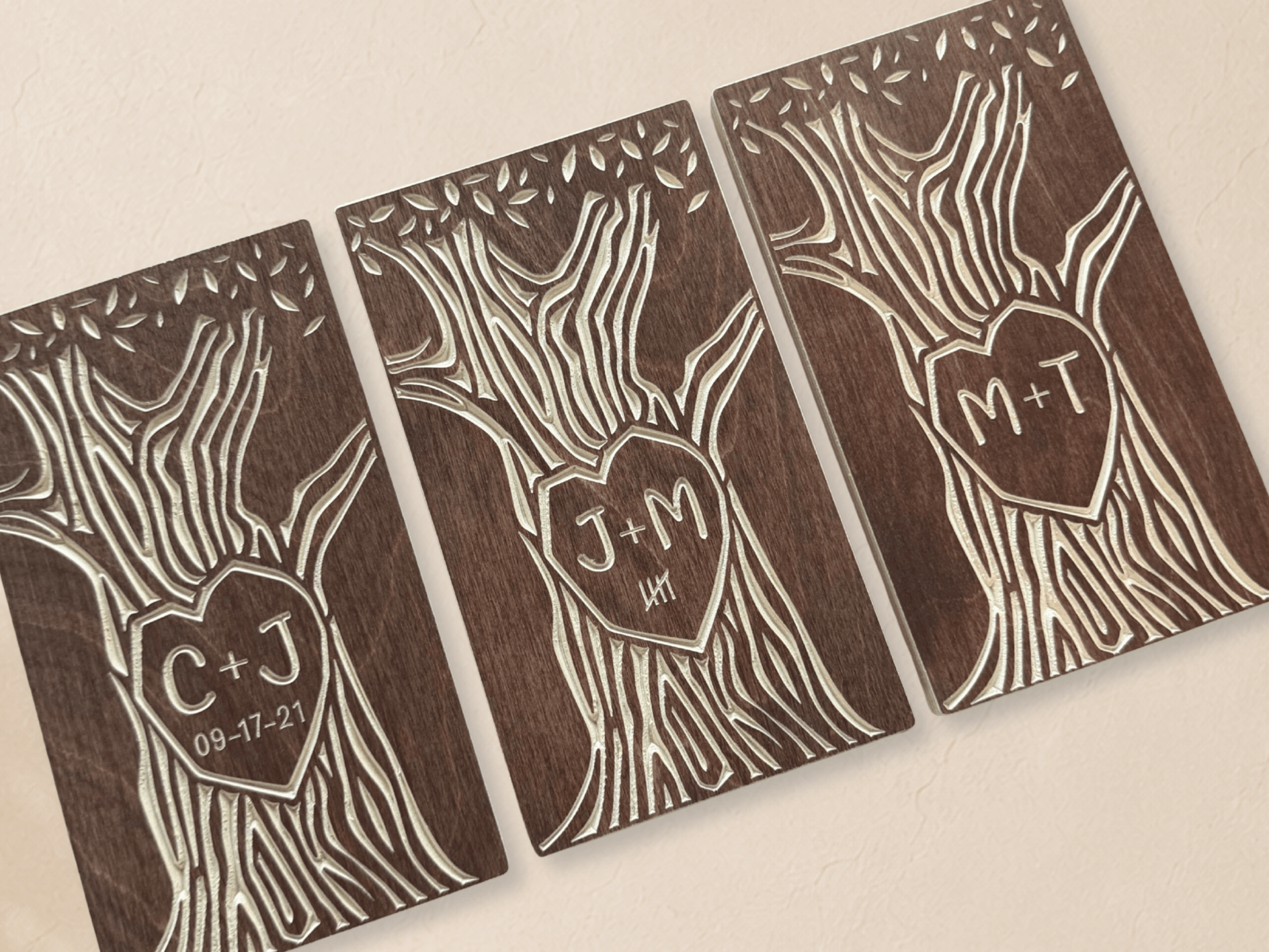Three walnut-stained trees showing different ways to personalize the gift.