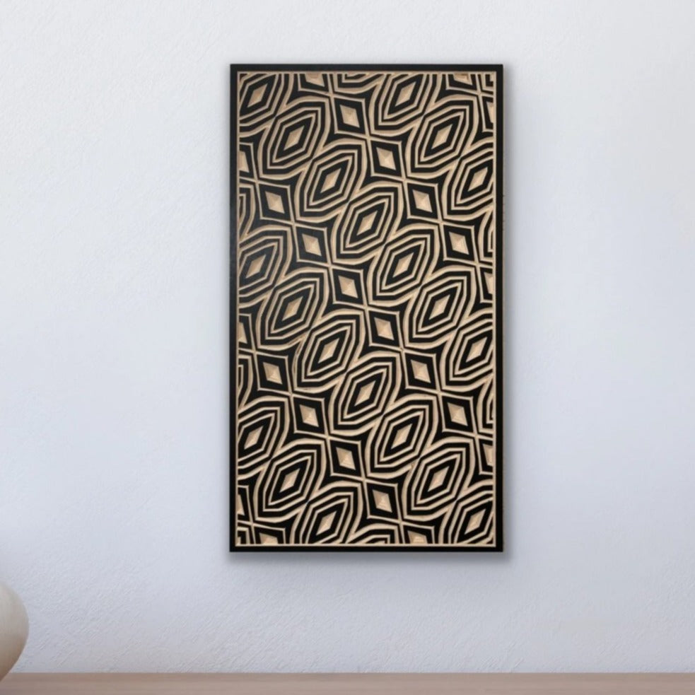 A rectangular carved wood wall art featuring a geometric pattern in a neutral color palette.